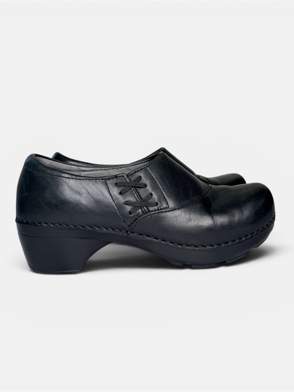 Dansko black leather lace up slip on clog
